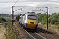 2010-07-15 16:24 43313 tails an East Coast HST at Grantham.