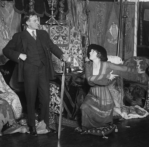 Film still of Guy Favières and Ina Claire