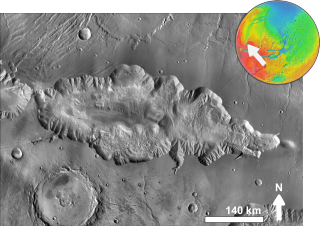 Hebes Mensa is a large mensa that rises from the floor of Hebes Chasma, one of the chasmata of the Valles Marineris network on Mars. Some researchers have identified this mesa to be an interior layered deposit (ILD), similar to Ganges Mensa, and are named for alternating light-toned and dark-toned layers forming a stair-stepped stratigraphy. The faces of Hebes Mensa are sometimes fluted. It is 7.5 kilometres (4.7 mi) tall and 120 by 43 kilometres wide.