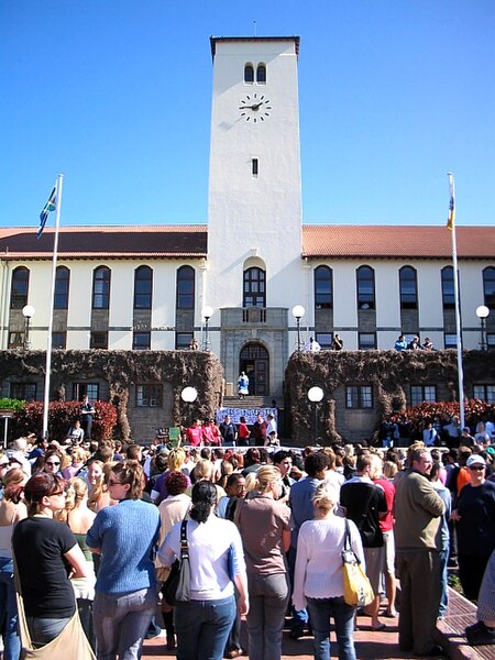 The Sir Herbert Baker clock tower at the heart of the Rhodes campus. The clock tower was designed by Herbert Baker in 1910 and constructed in subseque