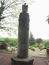 Cemetery cross and war memorial