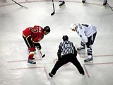 Jarome Iginla faces off against Vincent Lecavalier