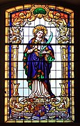 Stained glass window with the image of Saint Barbara in the Church of the Providence of God in Jaworze, Poland.