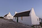 Until quite recently the fishermen's villages, most of them hardly more than hamlets, constituted some of the most interesting and picturesque features to be seen along the coast from Saldanha Bay to far beyond Cape L'Agulhas.
Type of site: House
Previous use: residential.
Current use: House. Last light, Kassies Bay.jpg