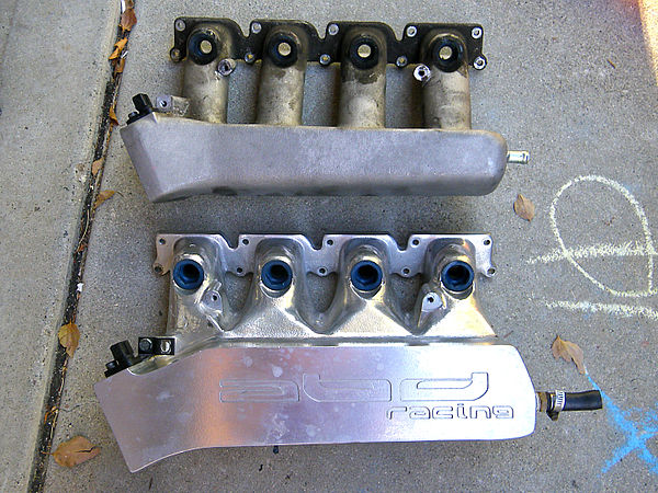 Comparison of a stock intake manifold for a Volkswagen 1.8T engine (top) to a custom-built one used in competition (bottom). In the custom-built manif