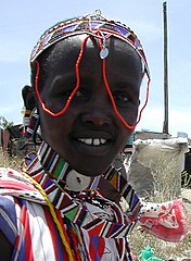 Image 6Maasai woman in traditional headdress and attire. (from Culture of Kenya)