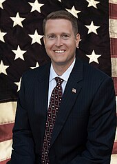 Matt Shea, a member of the Washington House of Representatives, was part of a coalition of five out-of-state politicians to meet with the militants on January 9 over objections expressed by local officials. Matt Shea.jpg