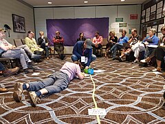 Participants during the "Considerations for Phase 2" Movement Strategy discussion at Wikimania 2017. The living chart being built