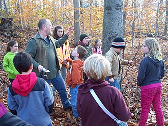 museum staff lead hikes on the adjacent conservation area or off-site Museum Hike.jpeg