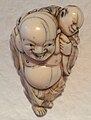 Netsuke: Hotei mit Karako, Japan 19. Jh.