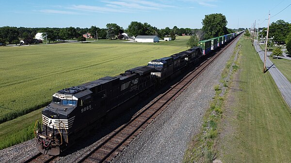 NS 9865, a GE Dash 9-40CW, leads an intermodal train in Wauseon, Ohio