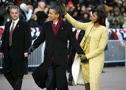 President Obama and First Lady Michelle Obama walking the inaugural parade route