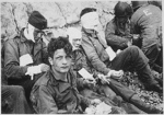 Thumbnail for File:Omaha Beach wounded soldiers, 1944-06-06.gif