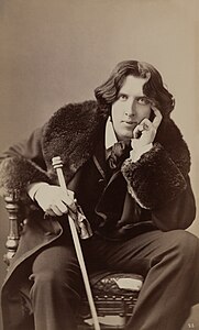 1882 Oscar Wilde by Napoleon Sarony. Three-quarter-length photograph, seated