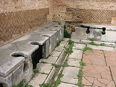 Image 44Public toilets (latrinae) from Ostia Antica (from Roman Empire)