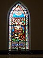 A stained glass window depicting Pentecost. Installed in 1873. Located in the middle of the west wall of Saint Anne's Episcopal Church at 8 Kirk Street Lowell, Massachusetts.