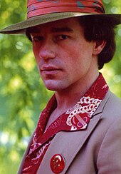 Phil Hartman had wished to make a live-action film based on his character Troy McClure, but the project was cancelled following his murder in 1998. Phil as Chick-1-1.jpg