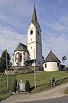 Catholic parish church St. Michael in Windisch St. Michael and churchyard wall with so-called Karner