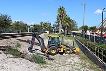 November 2015, carpark and SFRTA headquarter construction visible to the right Pompano Beach station reconstruction Nov 2015.jpg