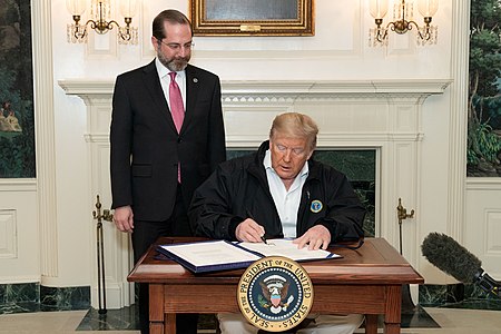 Tập_tin:President_Trump_Signs_the_Congressional_Funding_Bill_for_Coronavirus_Response_(49627907646).jpg