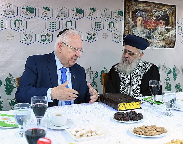 Yosef with Reuven Rivlin during the Sukkot holiday in 2017