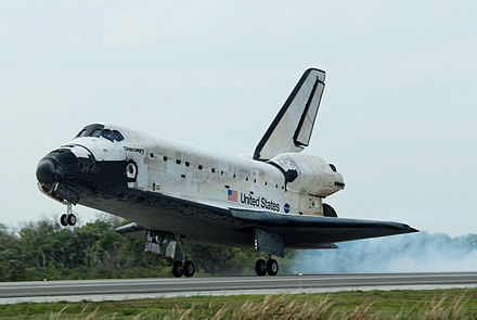 Space Shuttle Discovery lands after completing its STS-119 mission.