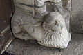 Détail d'une sculpture de lion couché dans l'entrée de l'église Notre-Dame de l'Assomption de Samoëns.}} Template:En