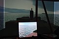 English: Ship's bridge simulator at IMAT training centre, Naples, Italy. Small screen shows "binocular" view Polski: Symulator mostka w centrum IMAT, Neapol. Mały ekran pokazuje widok "przez lornetkę"