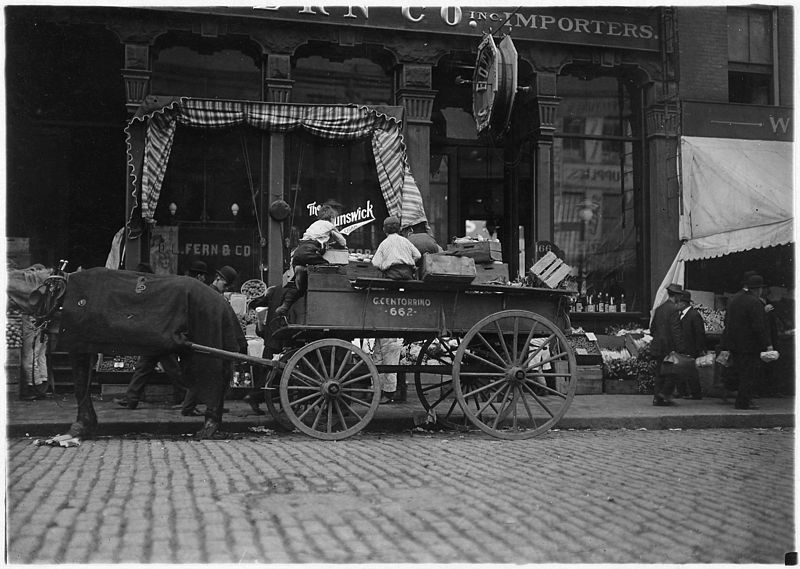 File:Starting in business early. Selling vegetables in the market. Boston, Mass. - NARA - 523224.jpg