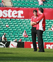 Roos (centre) as Sydney coach in 2009 Sydney coaches, Syd v PA 2009 (3559436552).jpg