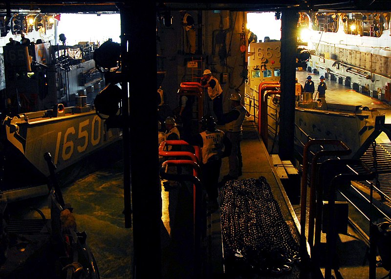 File:US Navy 071129-N-7987H-135 ailors aboard the amphibious assault ship USS Nassau (LHA 4) and Marines attached to the 24th Marine Expeditionary Unit load landing craft utility boats into the well decks of the Nassau.jpg