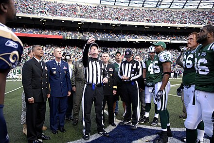 Each game begins with a coin toss to determine which team will initially possess the ball