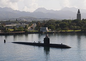 US Navy 120123-N-BK435-058 The Los Angeles-class fast-attack submarine USS La Jolla (SSN 701) dips the Ensign as the submarine tender USS Frank Cab.jpg