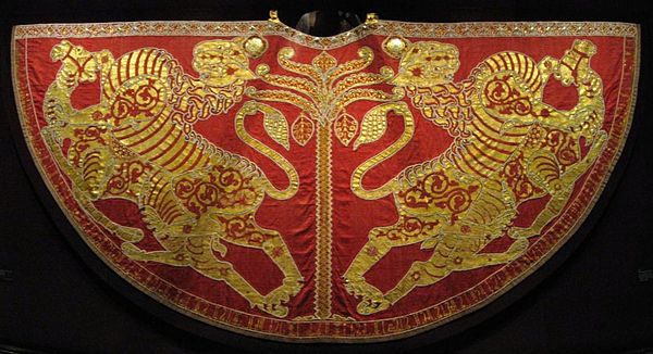 Royal mantle of Roger II, bearing an inscription in Arabic with the Hijrah date of 528 (1133–34). Imperial Treasury, Vienna, in the Hofburg Palace.