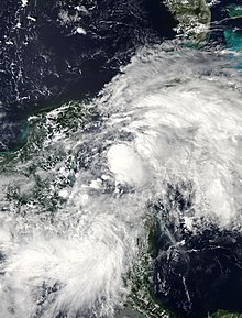 Satellite image of Potential Tropical Cyclone Fourteen developing east of the Yucatán Peninsula on October 6