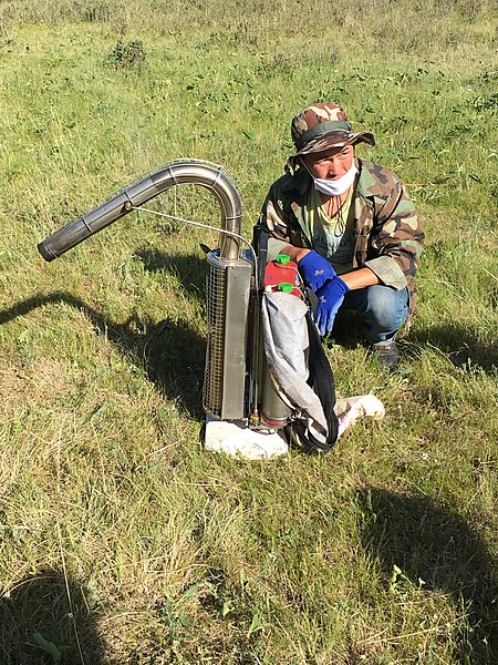 File:2017. Backpack based smoker pesticide application equipment. Pesticide mixes with diesel smoke and rises up into forest canopy. Bulgan province, Mongolia. (25711784598).jpg