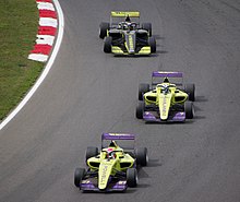 Alice Powell leads Emma Kimilainen and Beitske Visser at the 2019 W Series Brands Hatch round. 2019 W Series, Brands Hatch (48854908596).jpg