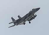 A US Air Force F-15C Eagle, tail number 83-0046, on final approach at Kadena Air Base in Okinawa, Japan