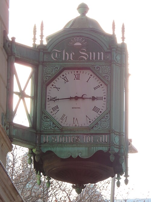 The clock of the "Sun Building" on Broadway, Manhattan, near Chambers Streets