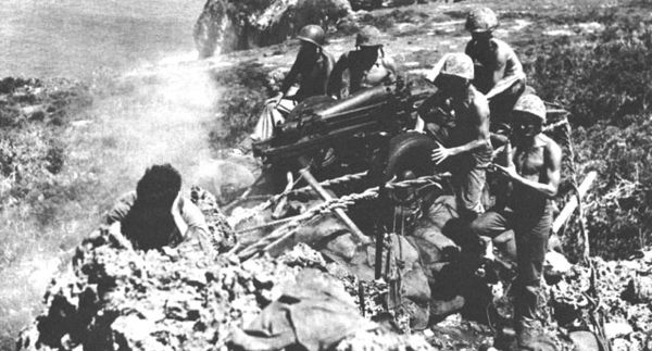 75 mm pack howitzer on carriage M8 during the Battle of Tinian.