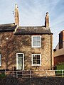 7 Bishopgate Street. House. c1830. Grade II listed.