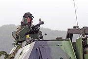 A Czech soldier waits for a convoy during Saber Junction 2014 at the Hohenfels Training Area in Hohenfels, Germany, Sept 140902-A-ZG808-062.jpg