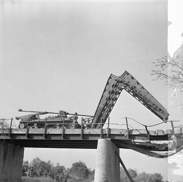 File:A Valentine bridgelayer of the 3rd Independent Bridge Building Company, Royal Armoured Corps, spans a damaged bridge near Meiktila, 28 March 1945.jpg