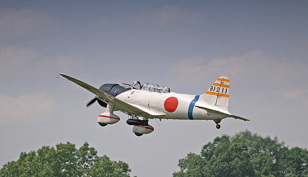 Aichi D3A replica at the Geneseo Airshow. In 1968 a Vultee BT-13 Valiant (N56867) was converted to a Val replica for use in the filming of the movie T