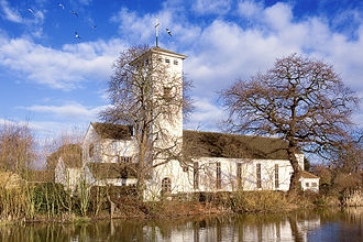 All Saints - Edward Maufe's brick built church showing features and proportions typical of his designs and part of Marney's Pond AllSaintsWGreen27Ja6-3272.jpg