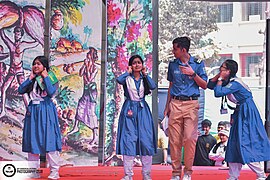 Students performing at cultural event