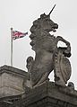 The statue of unicorn, on an ornamental pillar outside Buckingham Palace, London, England.