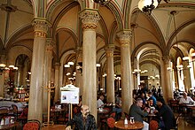 Cafe Central, a Viennese cafe established in the 19th century Cafe Central in Vienna interior near entrance.JPG