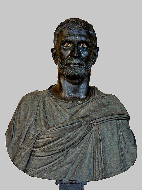 The so-called Capitoline Brutus, a bronze portrait head, glass-inlaid bone eyes, possibly late 4th to early 3rd centuries BC; bust is later