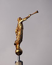 Angel Moroni atop the temple spire (2015) Chorley Mormon Temple Figure.jpg